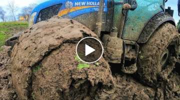 Newholland and Case in mud.