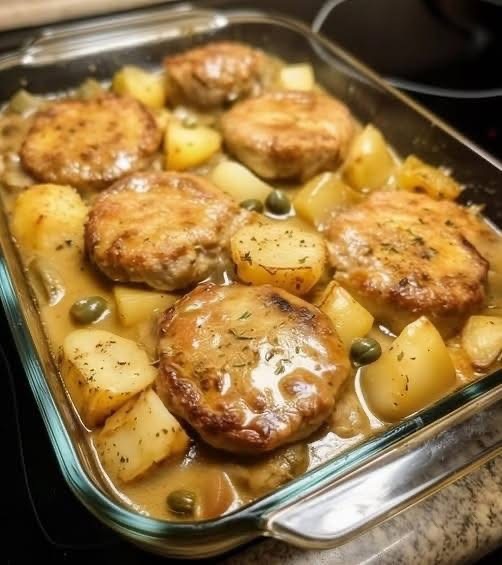 Smothered Pork Chops and Potatoes in Creamy Onion Gravy