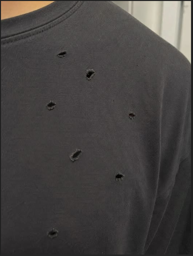 The Surprising Reason Small Holes Keep Appearing in Your Favorite T-Shirts