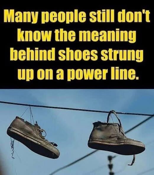 Why Are Sneakers Hanging From Power Lines? Exploring the Theories Behind a Curious Sight